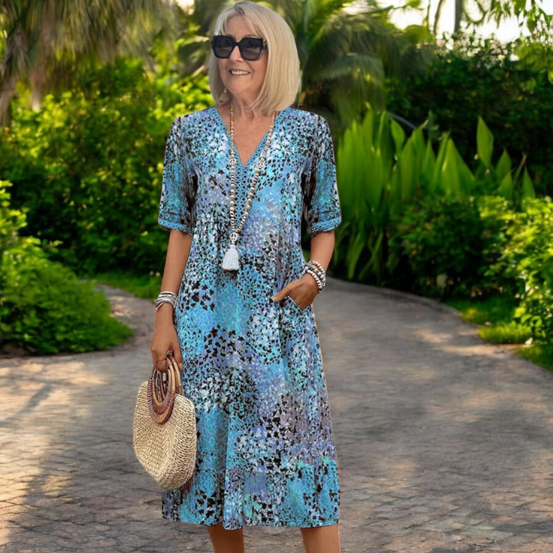 The Florence Floral V-Neck Midi Dress in a romantic floral print