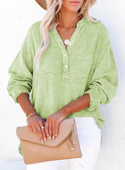 The Anouk Drape V-Neck Blouse — styled tucked into trousers