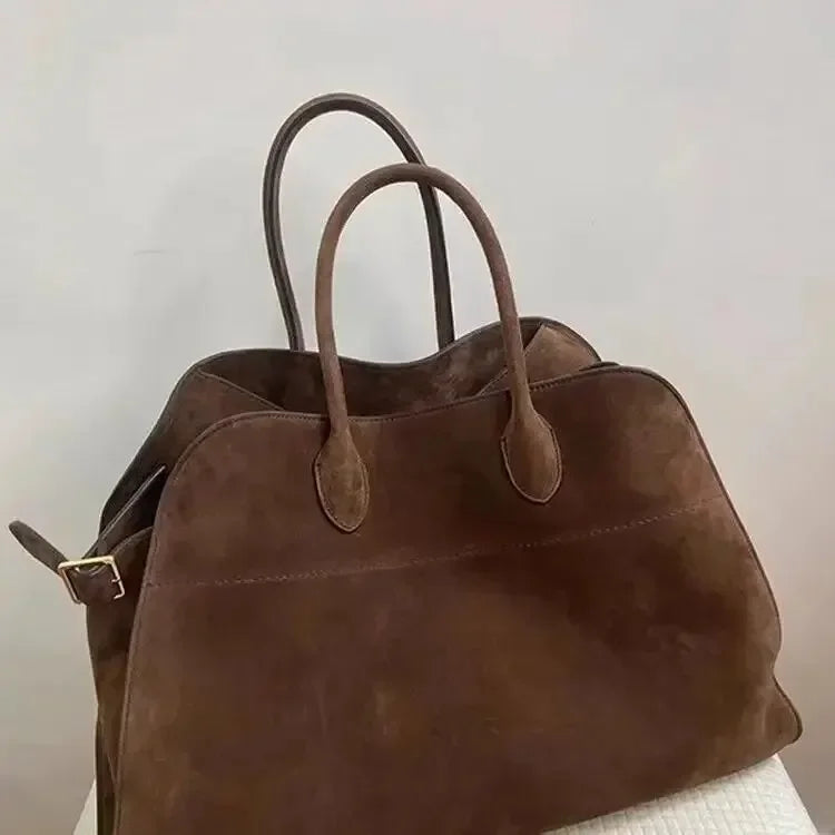 The Colette minimalist top-handle bag by Maison Fortin