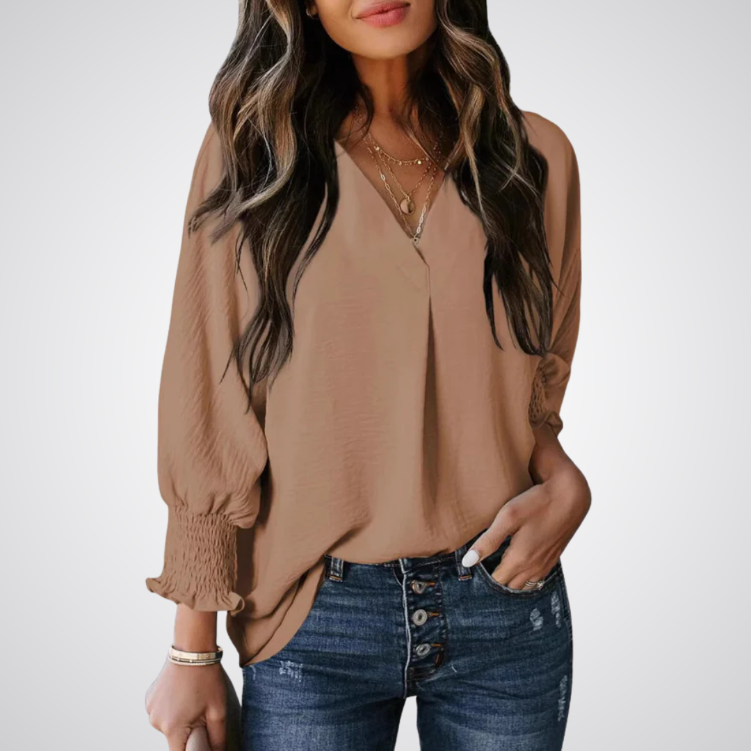 The Aurélie styled with slim leggings and tall boots