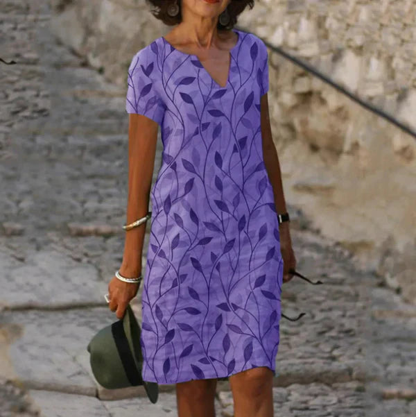 The Charlotte Botanical Leaf Print Midi Dress — styled view